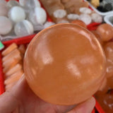 Large peach selenite sphere