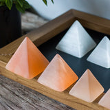 Orange selenite pyramid