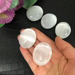 Selenite palm stones