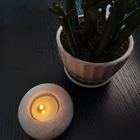 Rounded selenite candle holder