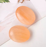 Red selenite palm stone