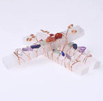 Selenite wand with chakra stones