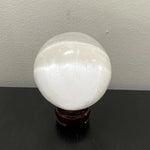 Selenite sphere with holder