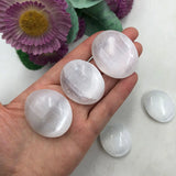 Egg shape selenite palm stone