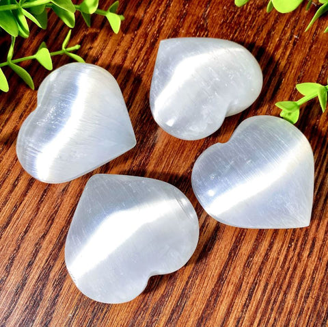Heart shaped selenite palm stone