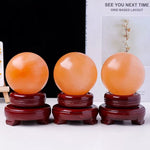 Peach selenite sphere