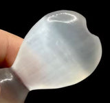 A close up view of the heart at the top of the wand.