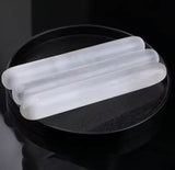3 polished wands next to each other with a smooth and polished surface.