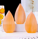 3 orange tear drop crystal.