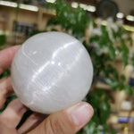 Small selenite sphere with stand